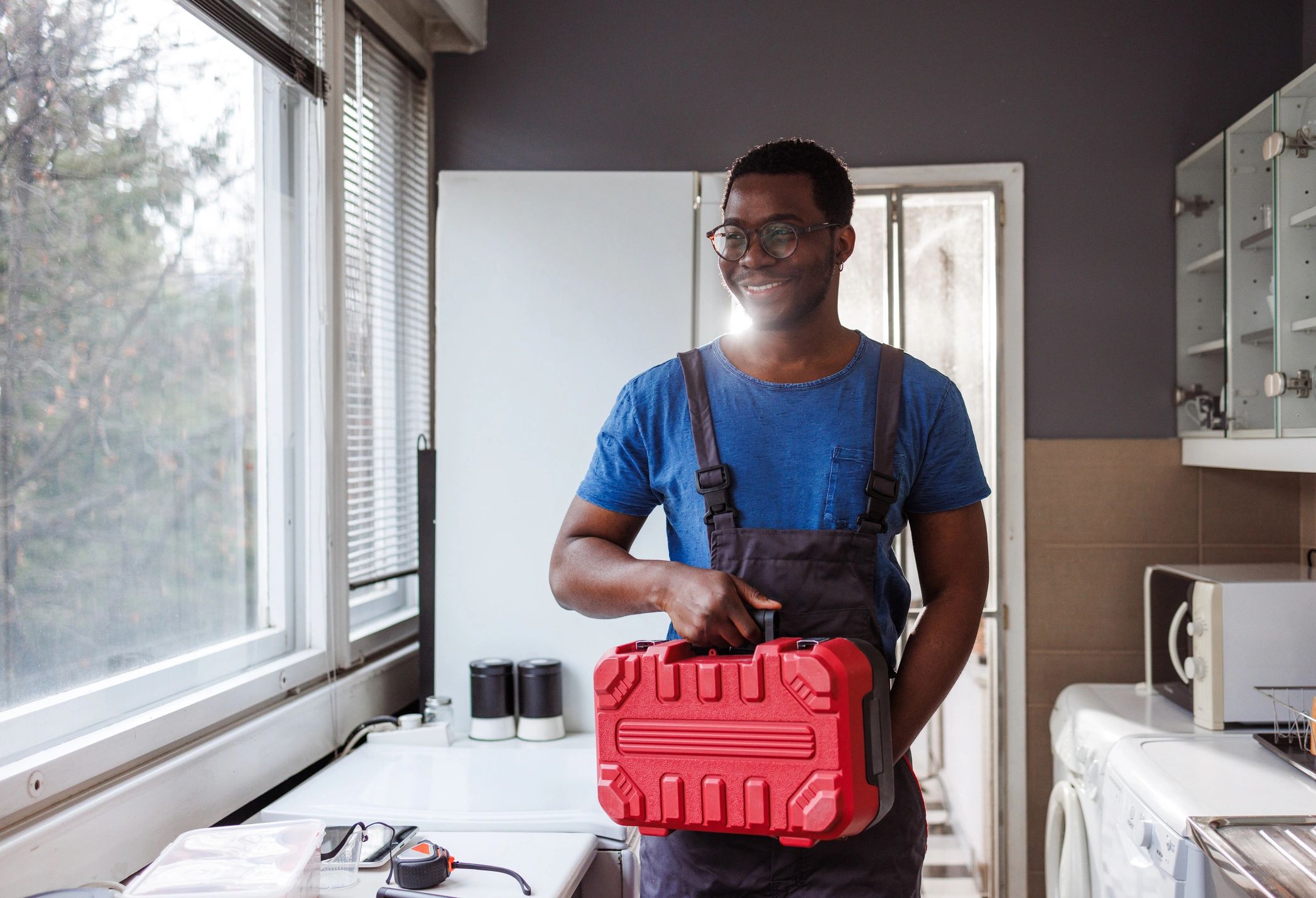 HVAC service professional ready for repair visit