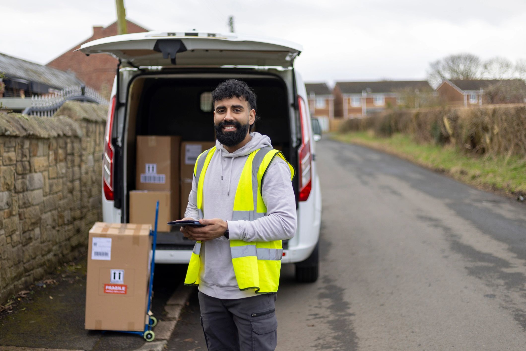 Patriot Mechanical Contractors service professional beside a van