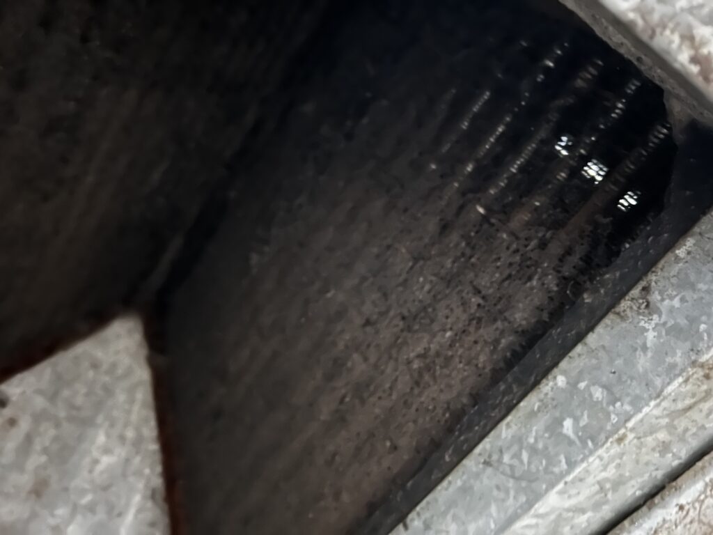 Dirty evaporator coil about to be cleaned.