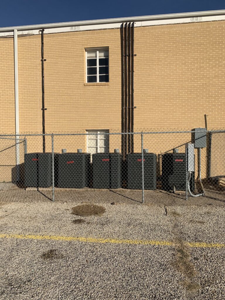 A row of new ac units installed for a church in San Angelo.