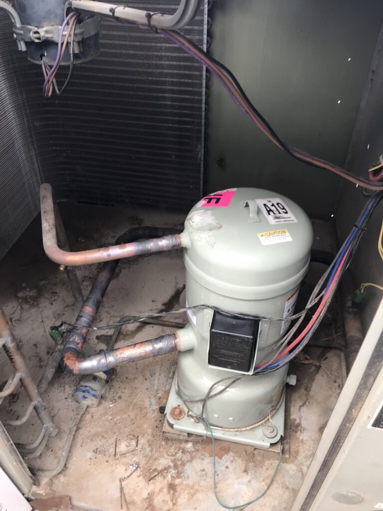 Replacing a large compressor at a commercial building in San Angelo.
